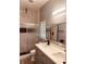 Double vanity bathroom with marble shower and modern fixtures at 1347 Heather Lake Dr, Orlando, FL 32824