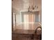 Bright and airy living room with tile floors and a chandelier at 1347 Heather Lake Dr, Orlando, FL 32824