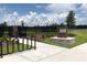 Modern dog park with bike rack; fenced and near a pond at 15871 Tollington Aly, Winter Garden, FL 34787