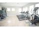 Modern fitness center featuring treadmills and elliptical machines at 15871 Tollington Aly, Winter Garden, FL 34787