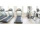 Modern fitness center with treadmills and elliptical trainers at 15871 Tollington Aly, Winter Garden, FL 34787