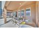 Outdoor patio with table, chairs, and grill at 7876 Oak Reflection Loop, Davenport, FL 33837