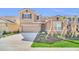 Two-story house with attached garage and landscaping at 7876 Oak Reflection Loop, Davenport, FL 33837