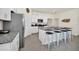 Modern kitchen with stainless steel appliances and granite countertops at 7876 Oak Reflection Loop, Davenport, FL 33837