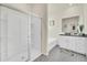 Elegant bathroom with a large shower, soaking tub, and granite vanity at 7876 Oak Reflection Loop, Davenport, FL 33837