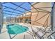 Large pool and spa with screened enclosure at 7876 Oak Reflection Loop, Davenport, FL 33837