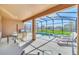 Private screened pool and spa with outdoor dining area at 7876 Oak Reflection Loop, Davenport, FL 33837
