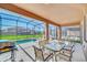 Screened pool area with patio furniture and grill at 7876 Oak Reflection Loop, Davenport, FL 33837