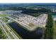 Aerial view showing new construction homes and surrounding landscape at 5237 Prairie Preserve Run, Saint Cloud, FL 34772