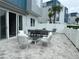 Outdoor patio with seating and dining areas at 7740 Sandy Ridge Dr # 135, Kissimmee, FL 34747