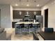 Modern kitchen with island, stainless steel appliances at 7740 Sandy Ridge Dr # 135, Kissimmee, FL 34747