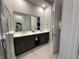 Double vanity with modern sinks and a shower at 7740 Sandy Ridge Dr # 135, Kissimmee, FL 34747