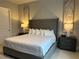 Spacious main bedroom with king-size bed and ample light at 7740 Sandy Ridge Dr # 135, Kissimmee, FL 34747