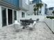 Outdoor patio with seating and dining areas at 7740 Sandy Ridge Dr # 135, Kissimmee, FL 34747