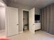 Bright bedroom with a closet and TV at 7740 Sandy Ridge Dr # 135, Kissimmee, FL 34747