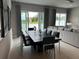 Open concept dining area with sliding glass doors at 7740 Sandy Ridge Dr # 135, Kissimmee, FL 34747