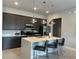 Modern kitchen with island, stainless steel appliances at 7740 Sandy Ridge Dr # 135, Kissimmee, FL 34747