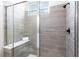 Walk-in shower with modern gray tile at 2112 Broome St, Kissimmee, FL 34743