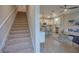 Carpeted staircase leading to the upper level of the home at 2112 Broome St, Kissimmee, FL 34743