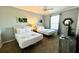 Bedroom with two twin beds, nightstands and a TV at 4814 Cayview Ave # 21013, Orlando, FL 32819