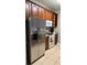 Kitchen with stainless steel appliances and wood cabinets at 4814 Cayview Ave # 21013, Orlando, FL 32819