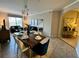 Open dining area with wooden table and seating for six at 4814 Cayview Ave # 21013, Orlando, FL 32819