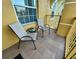 Relaxing balcony with two chairs and a small table at 4814 Cayview Ave # 21013, Orlando, FL 32819