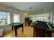 Game room with foosball table, card table, and seating at 1561 Corolla Ct, Reunion, FL 34747