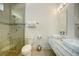 Modern bathroom with double vanity and shower at 1561 Corolla Ct, Reunion, FL 34747