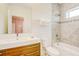 Modern bathroom with soaking tub and double sink vanity at 1561 Corolla Ct, Reunion, FL 34747
