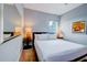 King-size bedroom with ensuite bathroom at 1561 Corolla Ct, Reunion, FL 34747