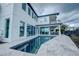 Inviting pool and patio area with a view at 1561 Corolla Ct, Reunion, FL 34747