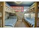 Spacious bedroom with bunk beds, Marvel-themed wall, and ample natural light at 1561 Corolla Ct, Reunion, FL 34747