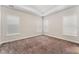 Well-lit bedroom featuring neutral walls and plush carpeting at 14663 Englert Aly, Orlando, FL 32827