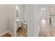 Clean and modern half bathroom with pedestal sink and toilet at 14663 Englert Aly, Orlando, FL 32827