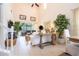 Spacious living room with high ceilings, white sofa, and plenty of natural light at 6316 Miramonte Dr # 106, Orlando, FL 32835