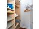 Well-organized walk-in closet with ample shelving and hanging space at 6316 Miramonte Dr # 106, Orlando, FL 32835