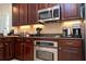 Close-up view of kitchen countertops and appliances, showing detail of design at 6316 Miramonte Dr # 106, Orlando, FL 32835