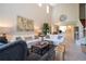 Bright living room with vaulted ceiling and ample natural light at 6316 Miramonte Dr # 106, Orlando, FL 32835