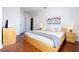 Spacious main bedroom with king bed and stylish decor at 6316 Miramonte Dr # 106, Orlando, FL 32835