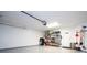 Garage with built-in shelving and overhead storage at 6316 Miramonte Dr # 106, Orlando, FL 32835