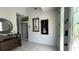 Entryway with tile floor, console table and framed guitars at 226 Mitnik Dr, Deltona, FL 32738
