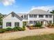 Two-story house with gray roof, white exterior, and black shutters at 226 Mitnik Dr, Deltona, FL 32738