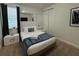 Bright bedroom with a queen-size bed and plenty of closet space at 420 Lasso Dr, Kissimmee, FL 34747