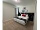 Spacious bedroom with a king-size bed and modern decor at 420 Lasso Dr, Kissimmee, FL 34747