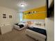 Themed bedroom with two twin-size beds at 420 Lasso Dr, Kissimmee, FL 34747