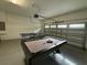 Garage with ping pong and pool tables at 420 Lasso Dr, Kissimmee, FL 34747