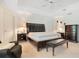 Spacious main bedroom with king-size bed, ceiling fan, and ample closet space at 1434 Hidden Meadow Way, Apopka, FL 32712