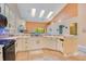 Modern kitchen featuring a large island, ample counter space, and stainless steel appliances at 1434 Hidden Meadow Way, Apopka, FL 32712