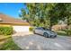 Home's exterior showcasing a driveway and garage at 1434 Hidden Meadow Way, Apopka, FL 32712